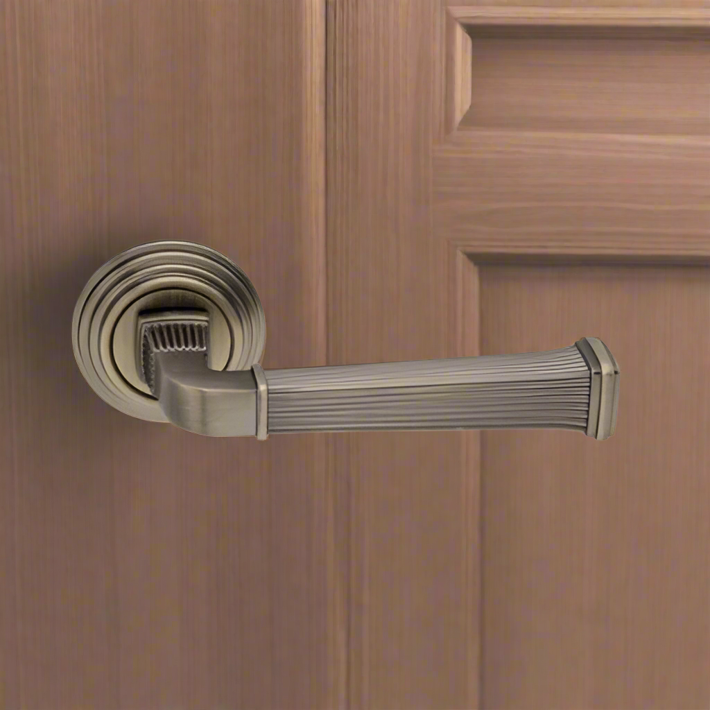EuroArt Lever Handle on Rose With Escutheons