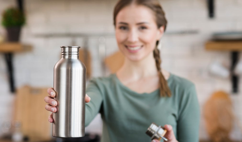 Person Using Flask The Top 10 Benefits of Using Flask Bottles | Your Ultimate Guide ...