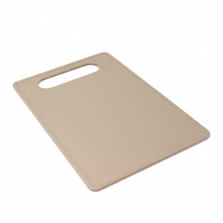 Beige plastic cutting board with handle slot and textured surface