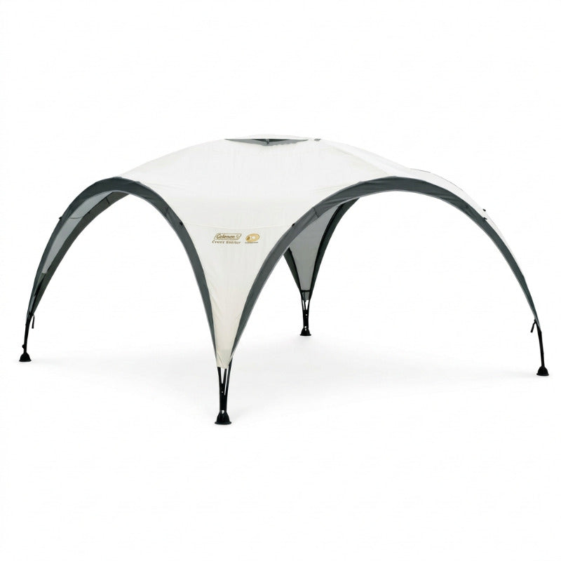 Large white event tent with curved dark frame and arched front doorway