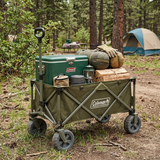 Coleman folding utility wagon with olive fabric panels, green lid, and four caster wheels