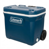 Coleman dark blue cooler with wheels, hinged lid, and side logo.