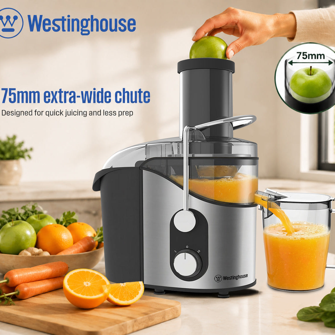 Westinghouse juice extractor with 75mm extra-wide chute, clear bowl, and juice jug