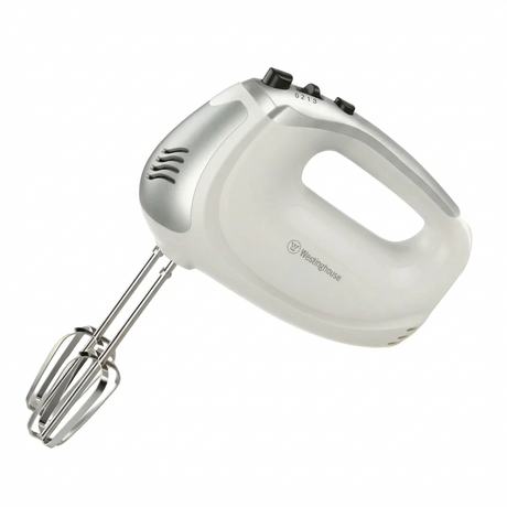 White handheld hand mixer with metal beaters in a hand grip