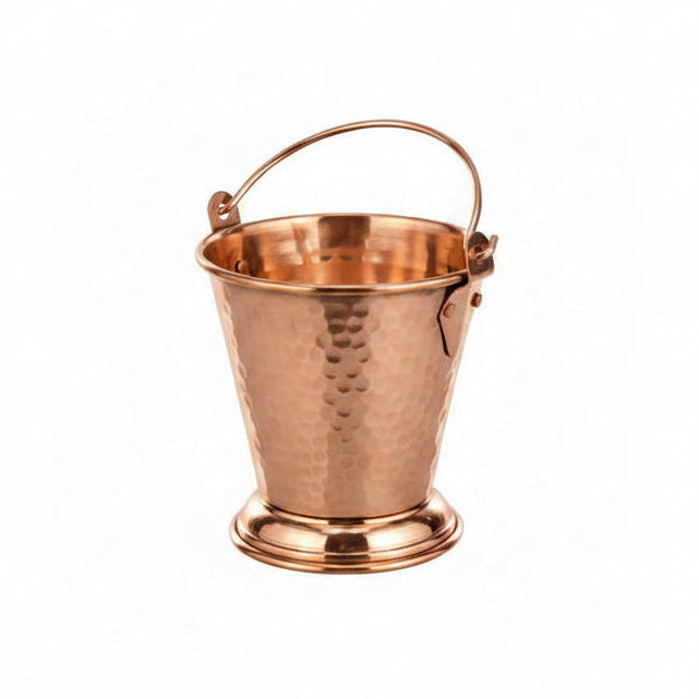 A hammered copper ice bucket with a polished stainless steel interior and a copper-colored metal handle, shown on a plain white background.