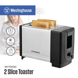 2-slice toaster with silver housing and black end caps, bread in the slots