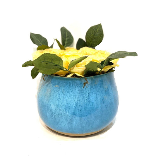 Faux Yellow Roses in Blue Pot