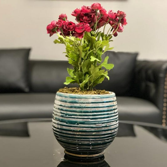 Faux Flower Arrangement in Blue Vase
