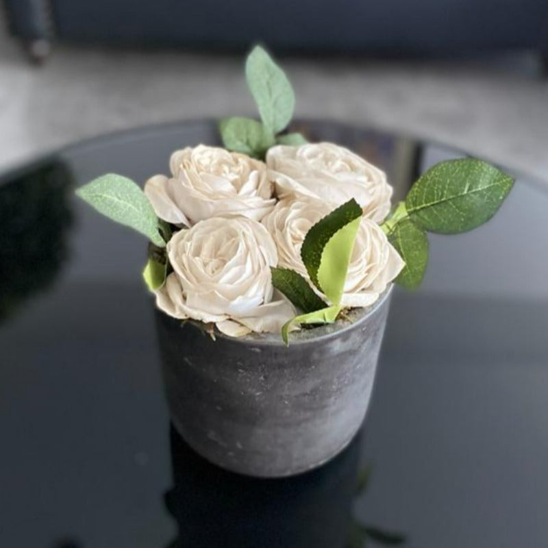 White Faux Roses in Black Cement Pot